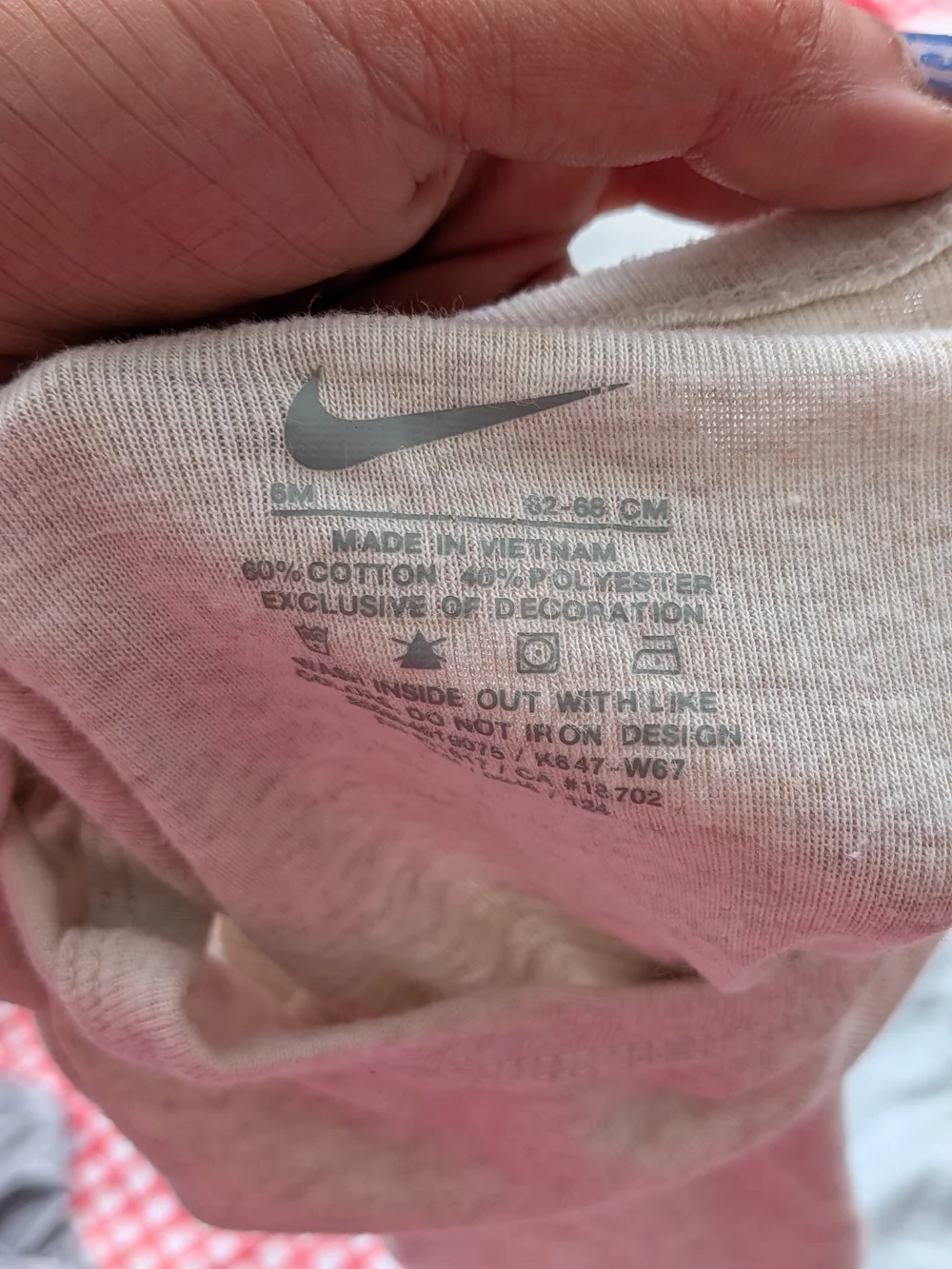 Nike Short-Sleeve Baby Onesies in Cream and Light Blue